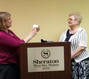 Joni Wilkinson recognizing Wilma Faulkner for her four years of service to Iowa WMU.