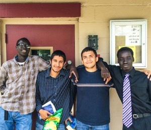 Leeh, Jose, Eric and Buop (L to R) relax after a work day at the Friendship Baptist Center