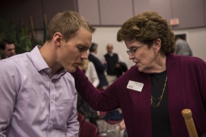 IMB trustee Audrey Smith (right) from the Northwest pauses to pray for IMB President David Platt following the missionary appointment service Feb. 23 in Richmond. The service celebrated 26 new missionaries who will be sent out to share the gospel around the world. (IMB Photo by Warren F. Johnson)