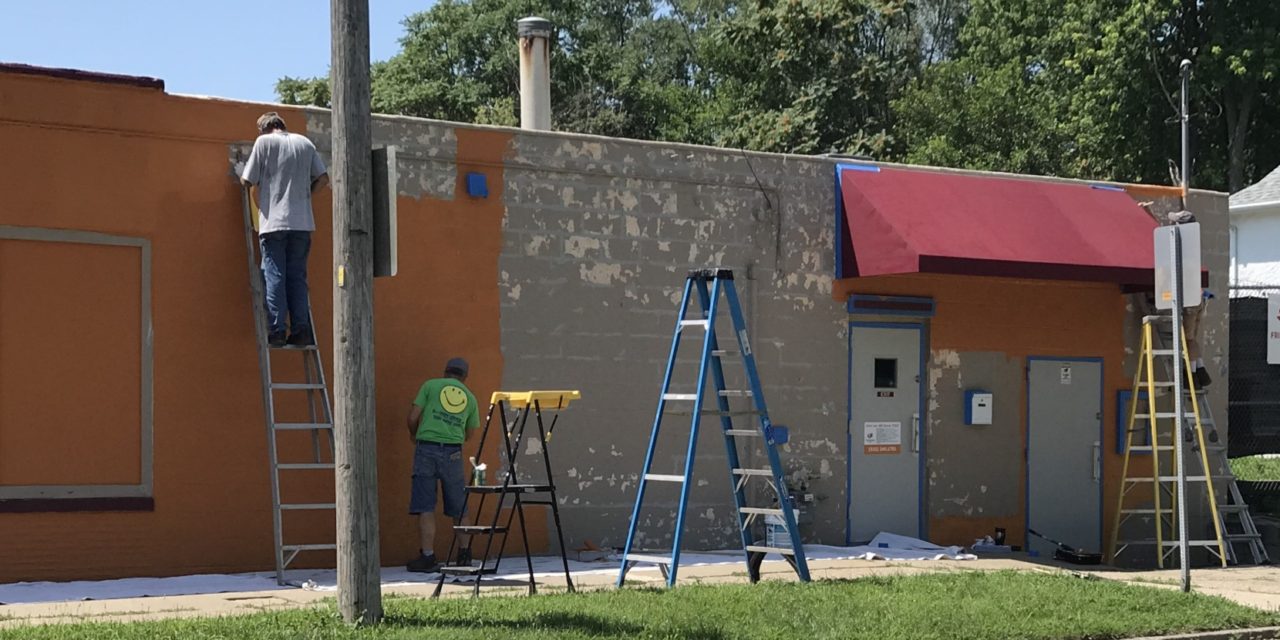 Iowa Campers on Mission paints Friendship Center
