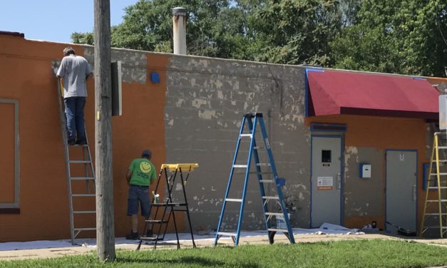 Iowa Campers on Mission paints Friendship Center